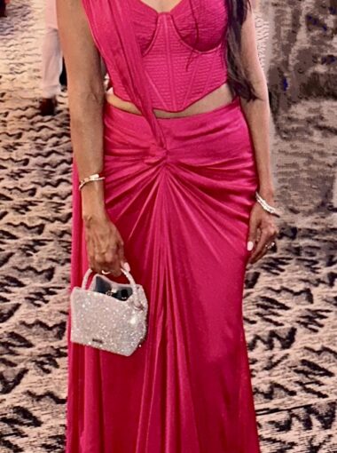 Monica Bhatia Pre-draped sari gown with double corset blouse in hot pink.