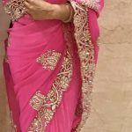 Hot pink saree with gold border