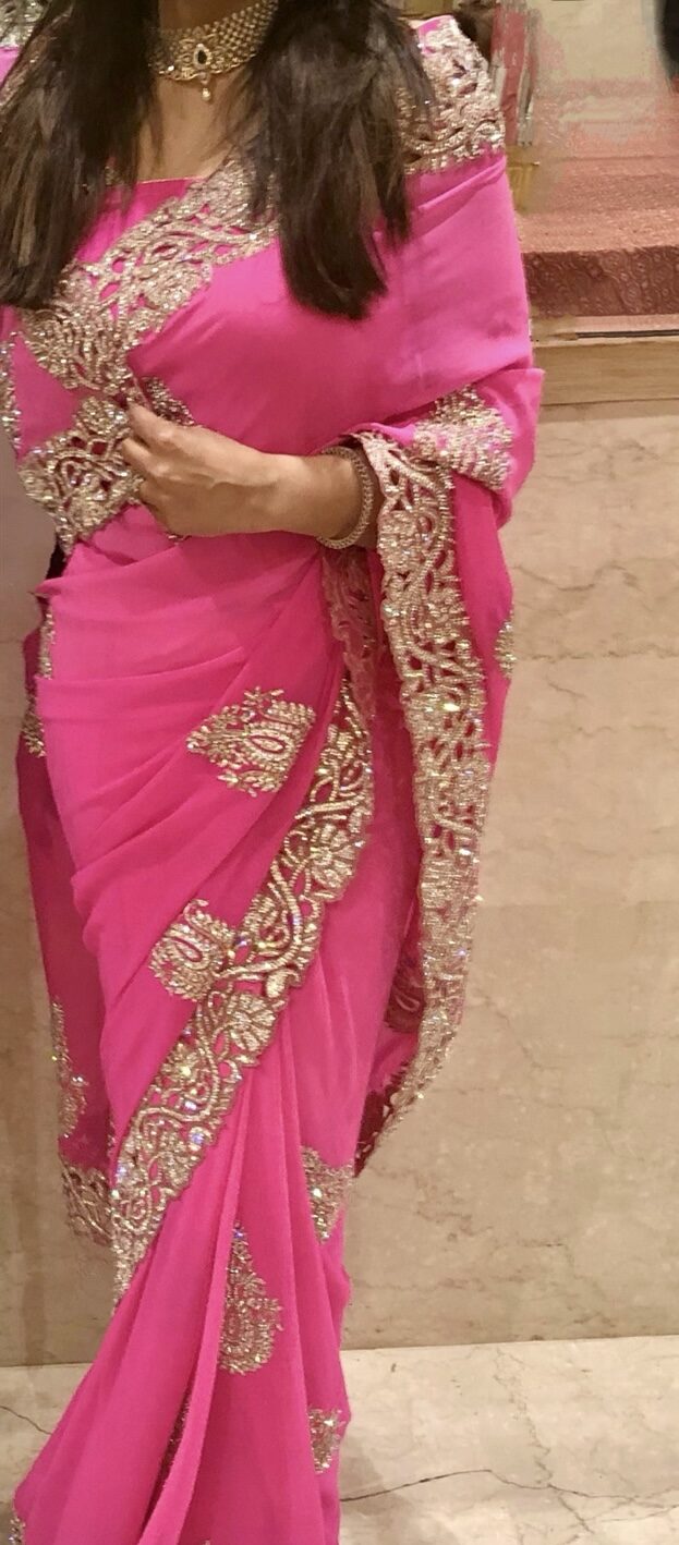 Hot pink saree with gold border