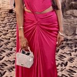 Monica Bhatia Pre-draped sari gown with double corset blouse in hot pink.