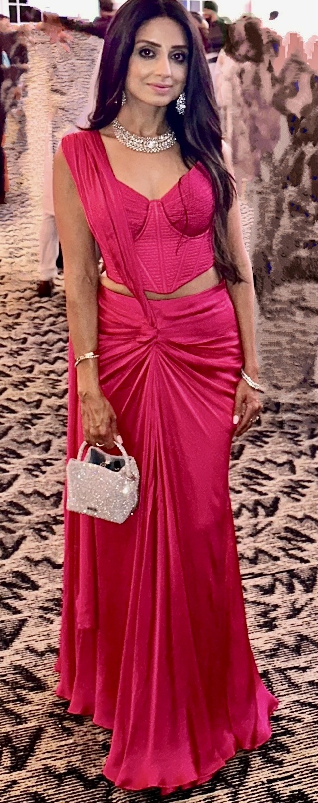 Monica Bhatia Pre-draped sari gown with double corset blouse in hot pink.