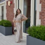 Mandira Curtis pre-stitched / draped sari with feather detailed cape and embellishments.