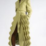 The Kinetic Tailored Coat: A chic, cozy coat which features our signature wave details