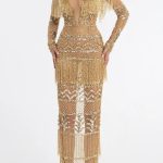 Albina Dyla gold gown
