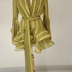 Mandira Curtis
yellow ruffle dress